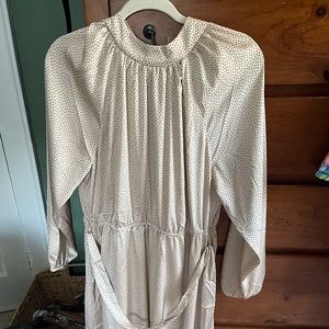 New dress never worn, gold with black polka dots.. silk long sleeve.